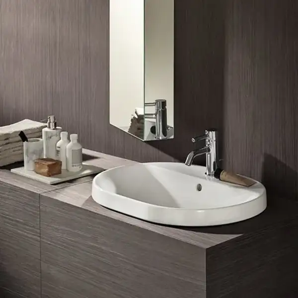 GEBERIT VARIFORM умывальник встраиваемый, овальной формы, 60*48см, с полкой для отверстия под смеситель, с переливом, глазурованный снизу (500.725.01.2) фото 3 Aquada.com.ua