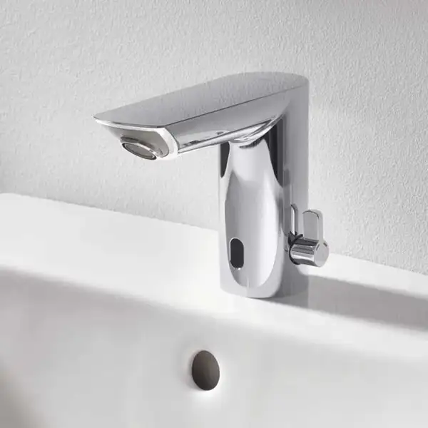 Змішувач для раковини Grohe Bau Cosmopolitan 220V, хром (36453000) Змішувач для раковини Grohe Bau Cosmopolitan 220V, хром (36453000)