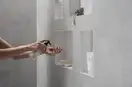 Настенная ниша со встроенной рамой Hansgrohe XtraStoris Original 30 x 30 x 10 см, белый матовый (56061700) фото 3 Aquada.com.ua