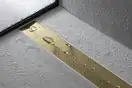 Внешняя часть трапа для душа, укорачиваемого 70 см Hansgrohe RainDrain Flex (полированное золото) 56050990